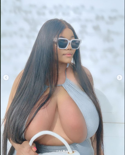 Endowed Instagram Star, Ada La Pinky Commands Attention As She Flaunts Her Massive Boobs In Revealing Dress (Photos) 
