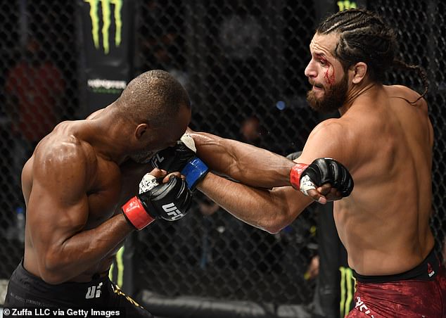 Nigerian UFC star, Kamaru Usman retains his Welterweight title by unanimous win after beating Jorge Masvidal (Photos)