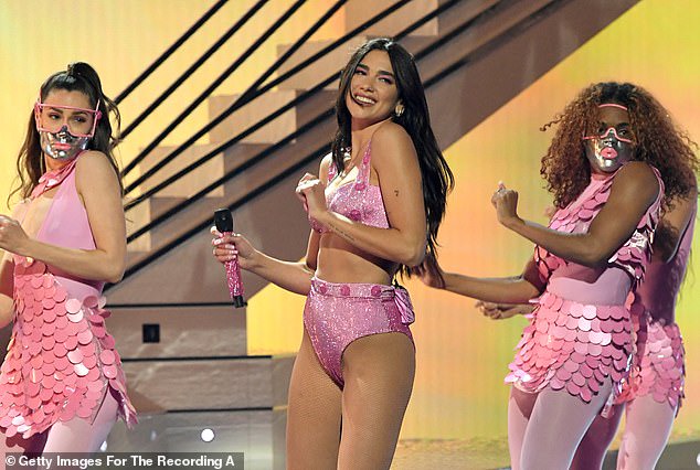 Singer, Dua Lipa strips down to her lingerie during racy performance at the 63rd Annual Grammy Awards (Photos)