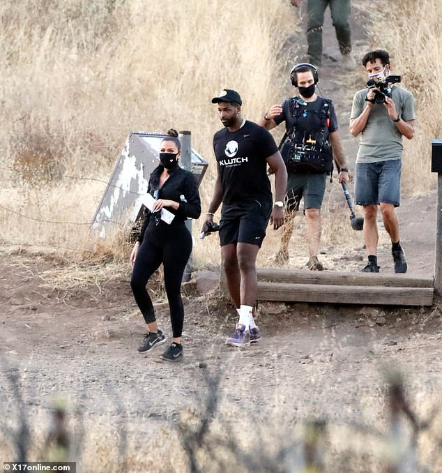 Khloe Kardashian and Tristan Thompson spotted looking "very happy" as they enjoy a hike together in Malibu hills (photos)