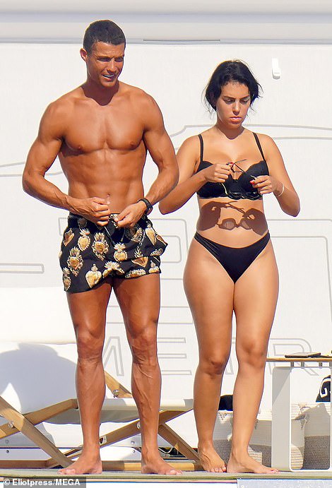 Cristiano Ronaldo and his partner Georgina Rodriguez soak up the sun onboard their ?5.5m superyacht in St.Tropez (photos)