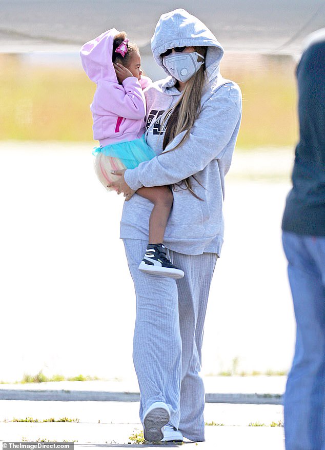 Beyonce and Jay-Z pictured for the first time since lockdown as they exit their private jet with Blue Ivy and their twins for a getaway in the Hamptons