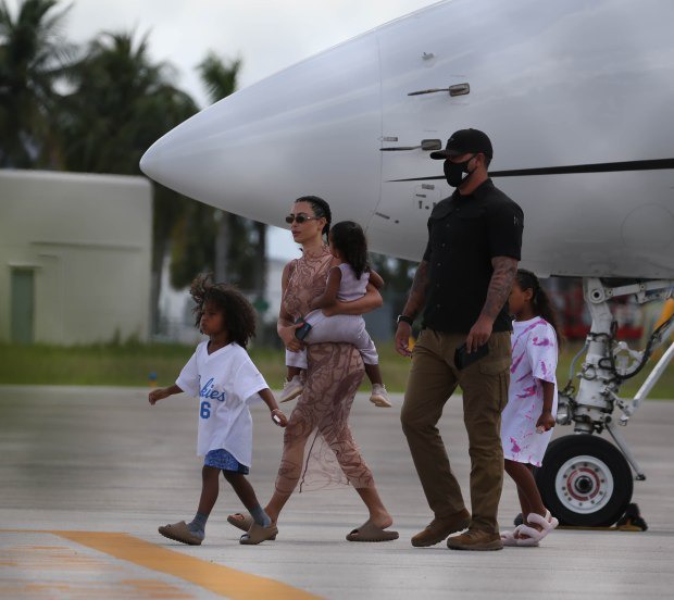 Kim Kardashian and Kanye West land in Miami after ?make or break? trip in the Dominican Republic (photos)