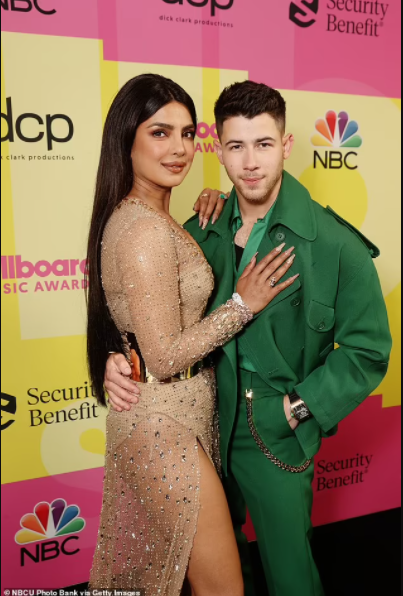 Nick Jonas and Priyanka Chopra pack on the PDA at the 2021 Billboard Music Awards (photos)