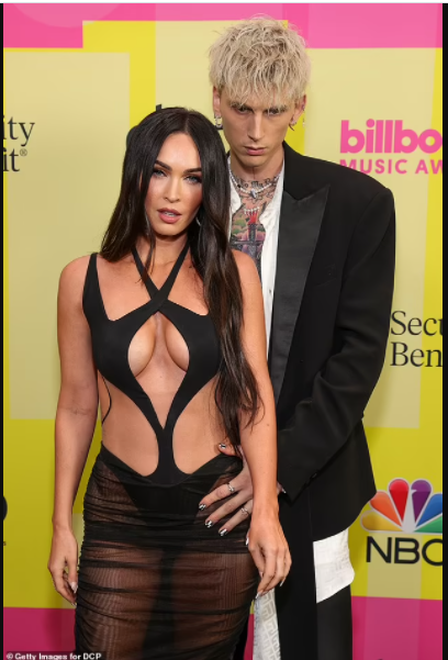 Megan Fox grabs boyfriend Machine Gun Kelly by his crotch at the 2021 Billboard Music Awards (photos)