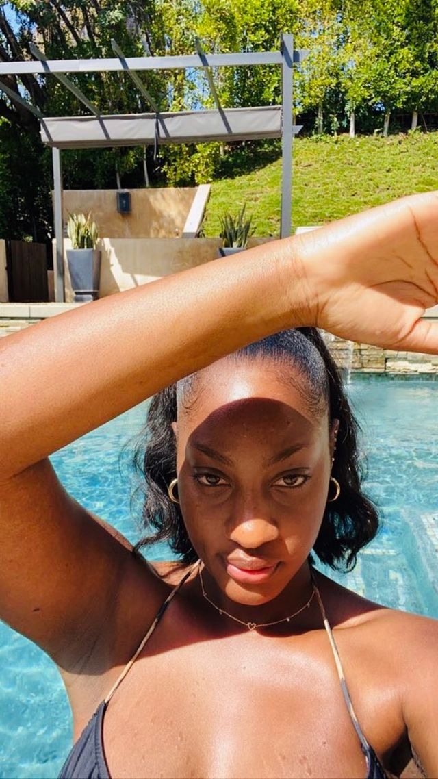 Singer, Tems shares sexy new photos of herself in a pool