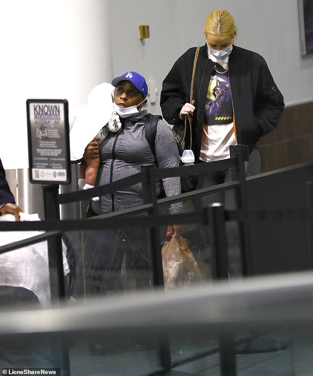 New mom, Iggy Azalea pictured arriving in Los Angeles with her baby boy?(Photos)