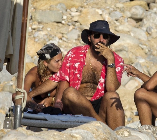 Rita Ora goes topless as she sunbathes with her boyfriend Romain Gavras and friends in Ibiza (Photos)