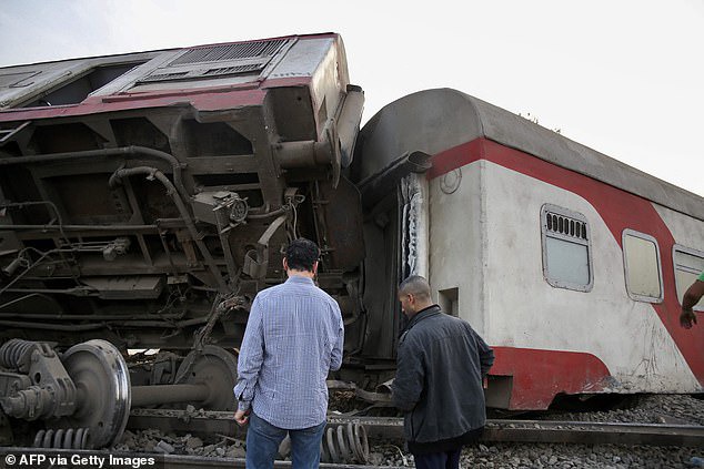 At least 11 people are killed and 100 injured as four passenger train carriages derail in Egypt?(photos)