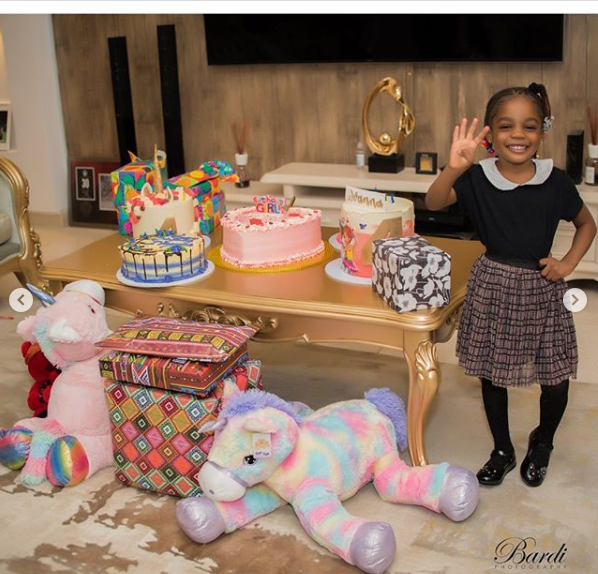 Super Eagles star, John Ogu and his ex-wife Vera Akaolisa team up for their daughter