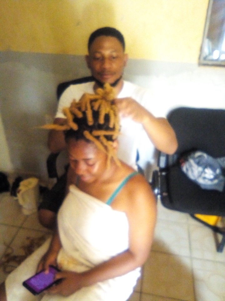 Brother Making His Sister’s Hair