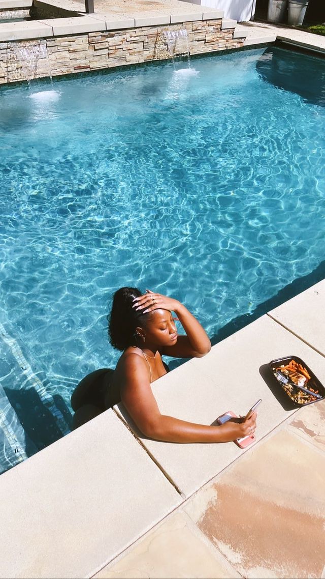 Singer, Tems shares sexy new photos of herself in a pool