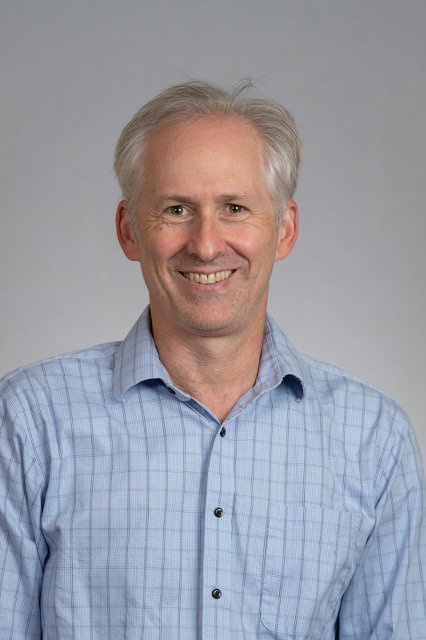 A man poses for a photo