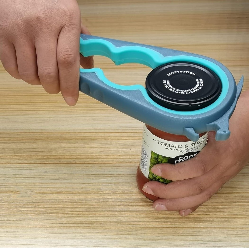 Jar opener device being used on a tomato and red pepper sauce jar on a wooden table