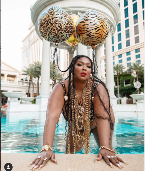 Lizzo showcases her famous curves in a tiger-print bikini to celebrate her 33rd birthday (photos)