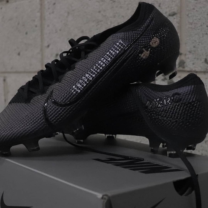 Alex Iwobi's new boots inscribed #ENDPOLICEBRUTALITY