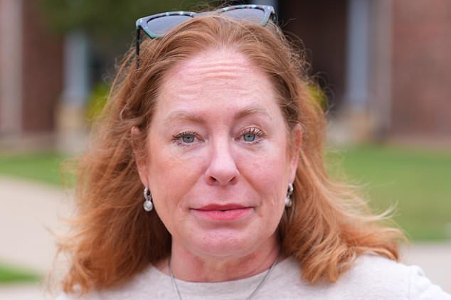 Liz Suder poses for a photo in former neighborhood n Murphy, Texas, Tuesday, Oct. 13, 2026. (AP Photo/LM Otero)