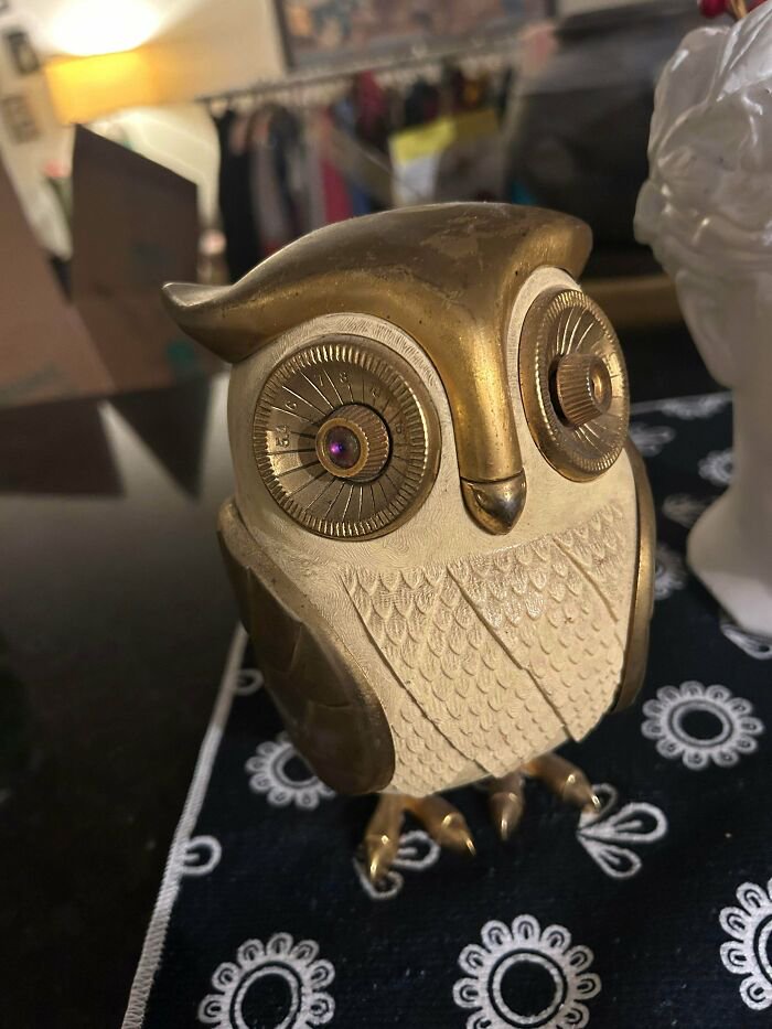 A vintage owl-shaped radio with tuner dials for eyes, showcasing artistic retro gadgets from the past.
