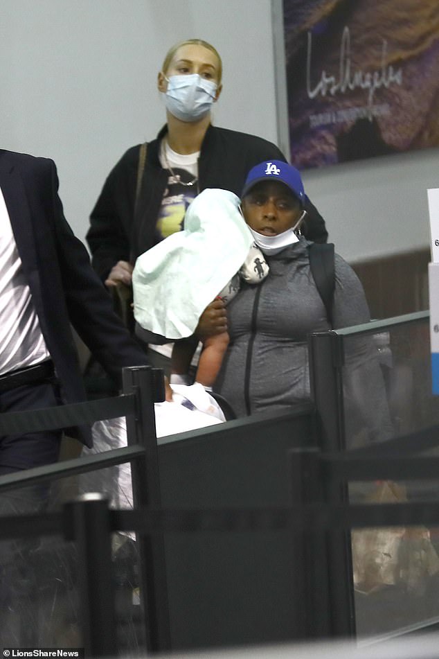 New mom, Iggy Azalea pictured arriving in Los Angeles with her baby boy?(Photos)