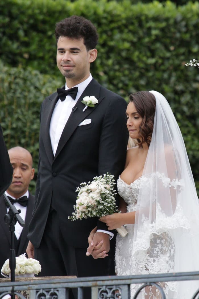 Heiress Elettra Lamborghini stuns in a sheer lace mermaid gown as she marries Dutch DJ Afrojack at a lavish villa in Italy (photos)