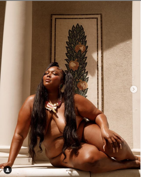 Lizzo poses completely nude with her besties in new photos