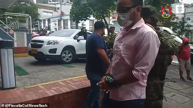 Colombian drug cartel accused of giving women breast implants made of liquid cocaine before sending them to Europe is raided by police (photos)