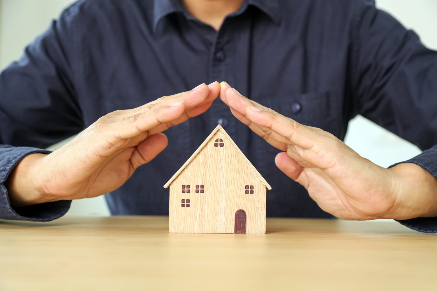 Financial planning for home loan concept hand and house for plan of money savings management for buy housing residential or family insurance or banking agreement.