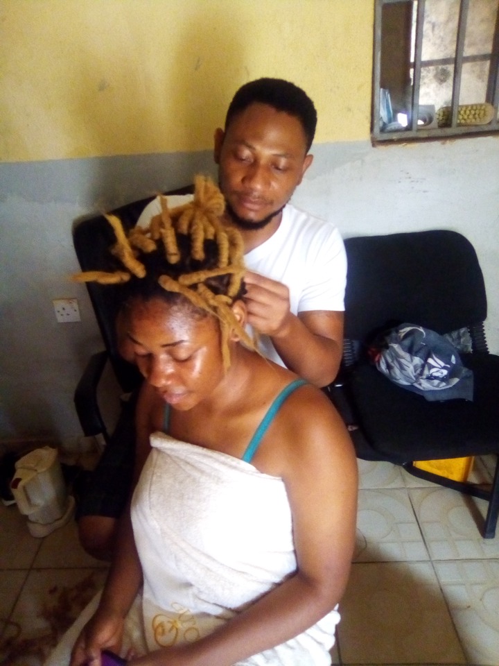 Brother Making His Sister’s Hair