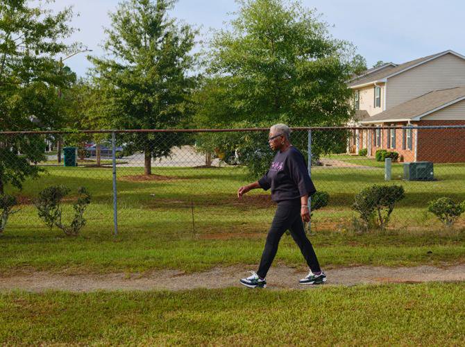 Dianne Williams started walking at a local track after a nurse suggested she exercise to help lower her blood pressure. Williams’ monthly phone calls with the nurse are part of a patient monitoring program. **KFF Health News provided photos must include...