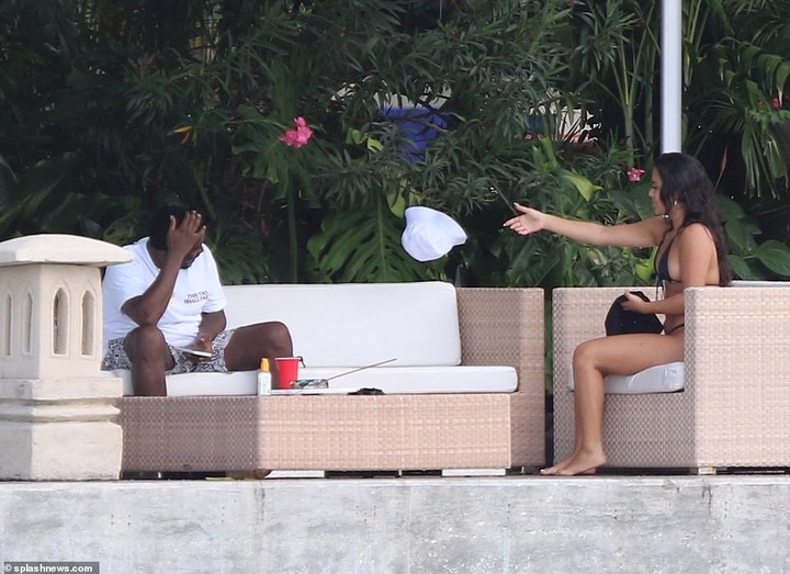P. Diddy spotted with another mystery woman at his Miami Beach mansion few days after he was pictured kissing model Tina Louise (Photos)