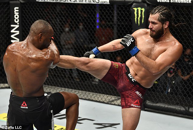 Nigerian UFC star, Kamaru Usman retains his Welterweight title by unanimous win after beating Jorge Masvidal (Photos)