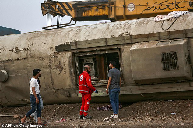 At least 11 people are killed and 100 injured as four passenger train carriages derail in Egypt?(photos)