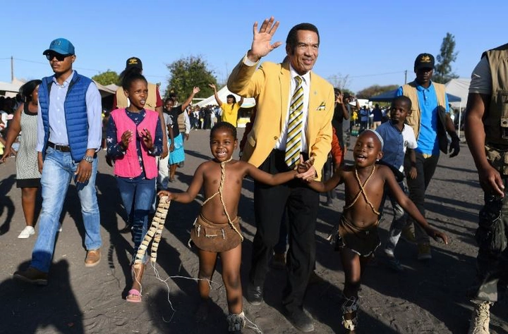 Botswana former president Ian Khama (C) has quit the BDP and thrown his support behind its strongest rival -- opposition coalition Umbrella for Democratic Change (UDC)