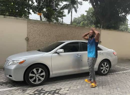 Singer, Flavour surprises his childhood friend with a car (photos)