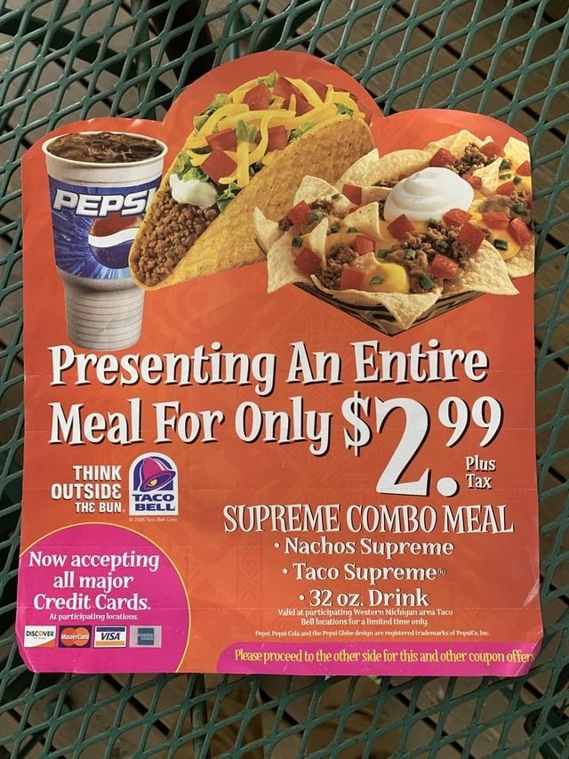 Taco Bell promotion for a $2.99 meal deal with tacos, nachos, and a drink. Includes logos for Taco Bell, Pepsi, major credit cards accepted