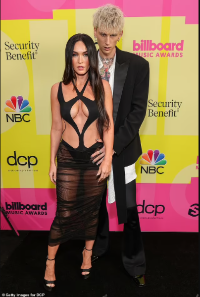 Megan Fox grabs boyfriend Machine Gun Kelly by his crotch at the 2021 Billboard Music Awards (photos)