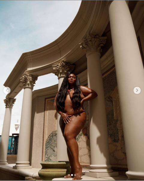 Lizzo poses completely nude with her besties in new photos