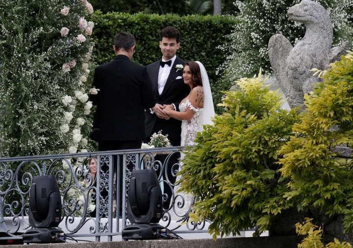 Heiress Elettra Lamborghini stuns in a sheer lace mermaid gown as she marries Dutch DJ Afrojack at a lavish villa in Italy (photos)