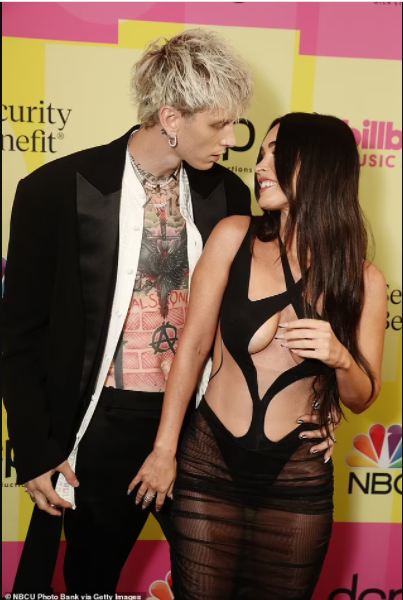 Megan Fox grabs boyfriend Machine Gun Kelly by his crotch at the 2021 Billboard Music Awards (photos)