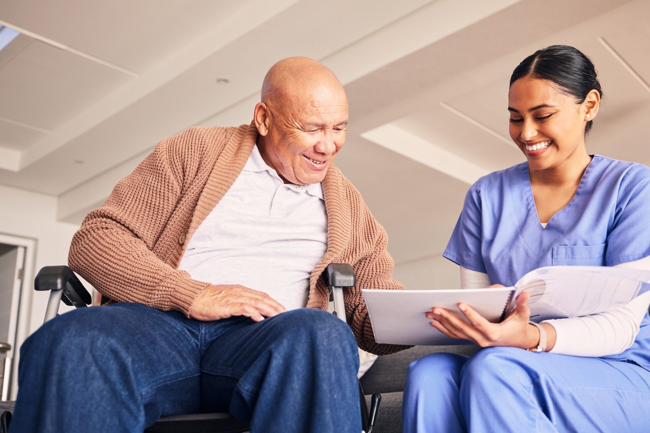Nurse or caregiver with senior man.