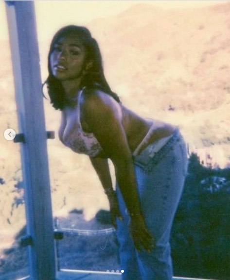 Jordyn Woods takes down her jeans to reveal her skimpy underwear in sexy new photos