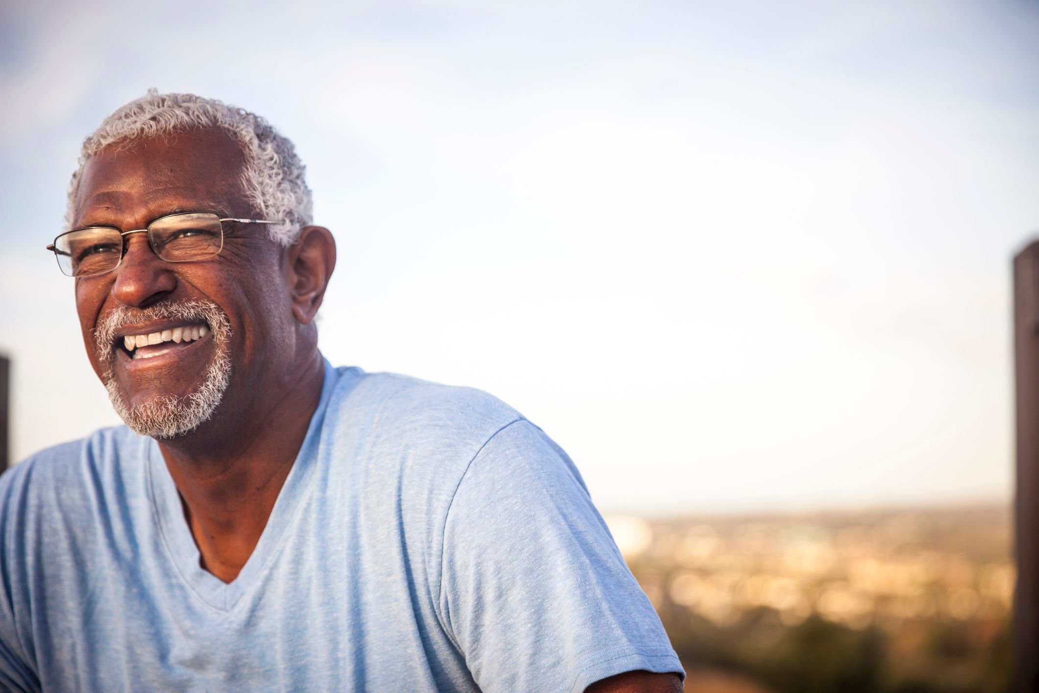 A smiling person outdoors