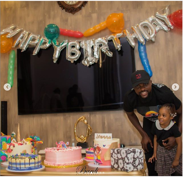 Super Eagles star, John Ogu and his ex-wife Vera Akaolisa team up for their daughter