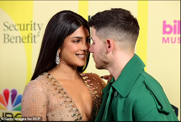 Nick Jonas and Priyanka Chopra pack on the PDA at the 2021 Billboard Music Awards  (photos)