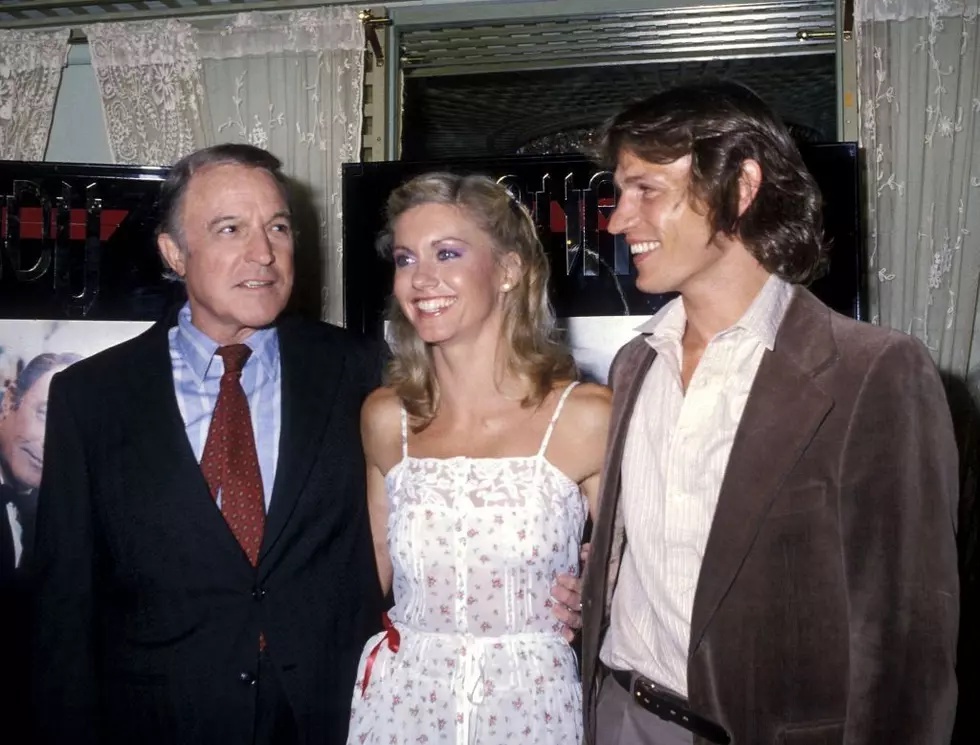 Actor Gene Kelly, singer Olivia Newton-John and actor Michael Beck attend the