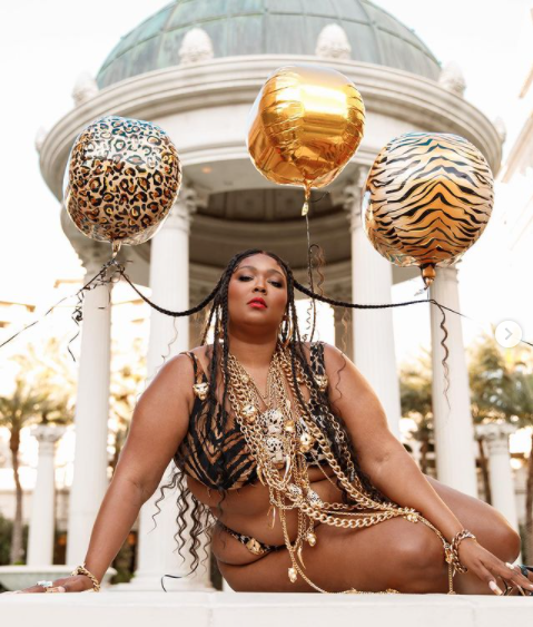 Lizzo showcases her famous curves in a tiger-print bikini to celebrate her 33rd birthday (photos)