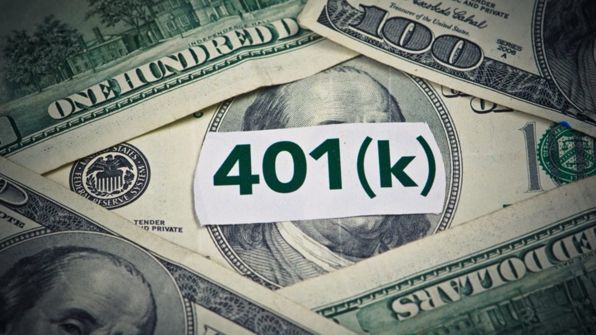 Discover an image depicting some hundred dollar bills and a paper reading "401K" that is about retirement savings
