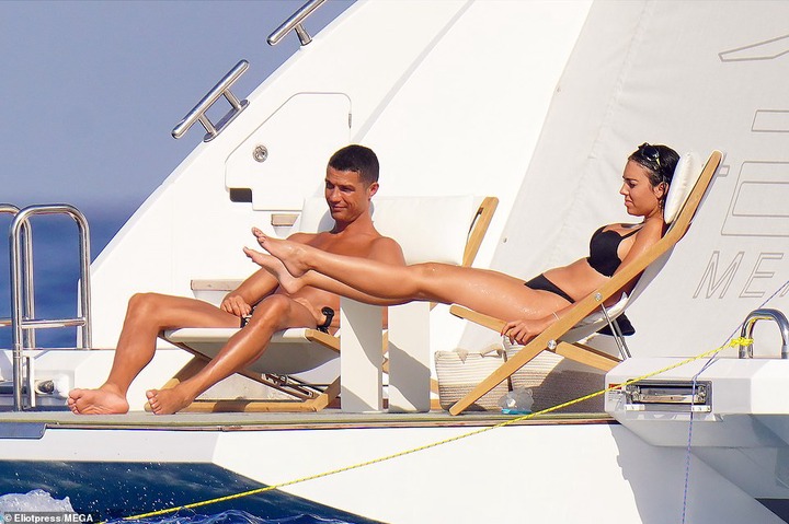 Cristiano Ronaldo and his partner Georgina Rodriguez soak up the sun onboard their ?5.5m superyacht in St.Tropez (photos)