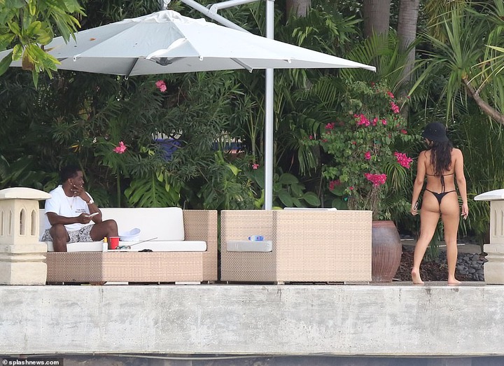 Hip-pop mogul, Diddy spotted with mystery woman at his Miami Beach mansion days after he was pictured kissing model Tina Louise (Photos)