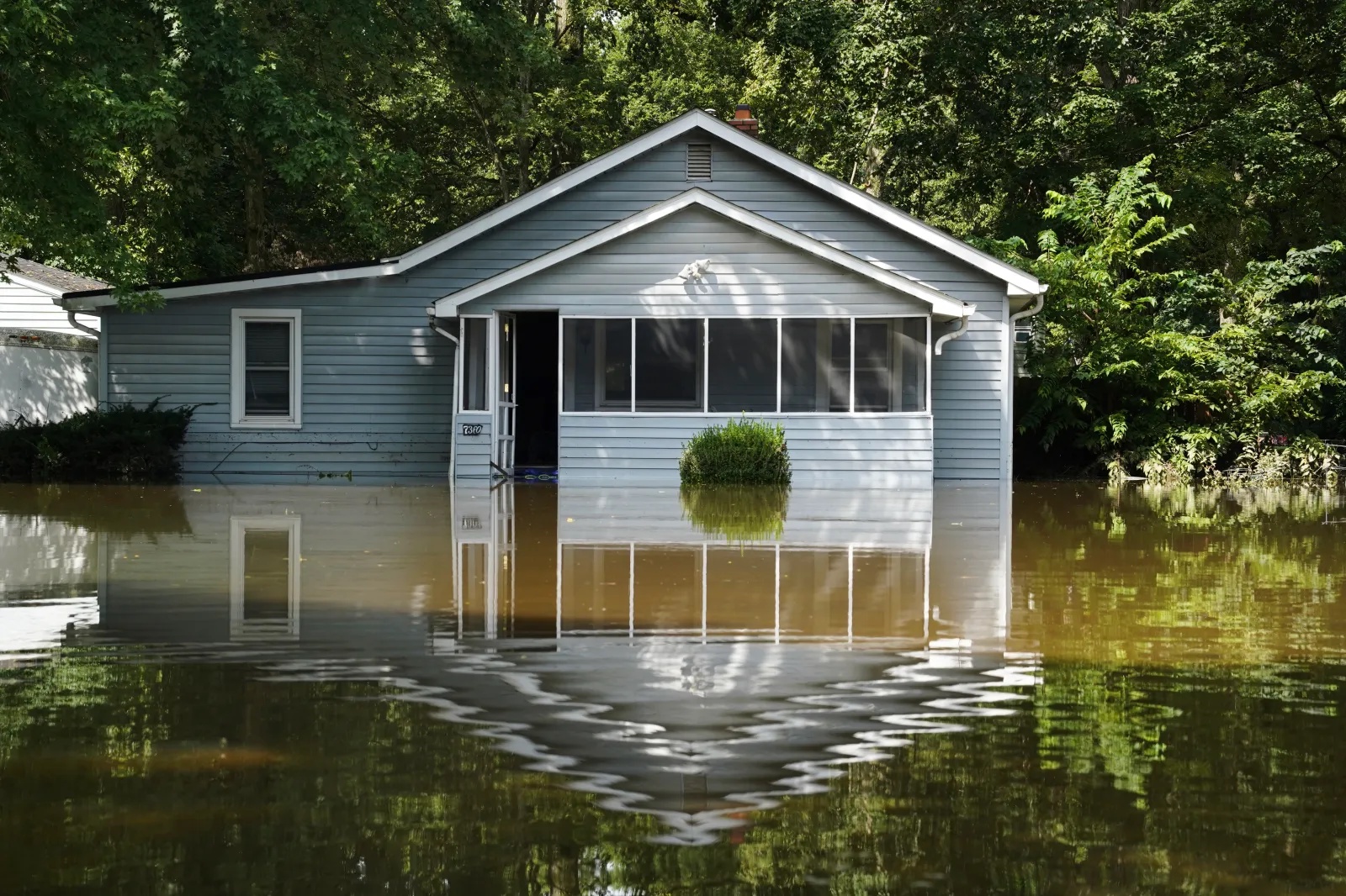 A flooded home in Indianapolis photographed on August 16, 2026.